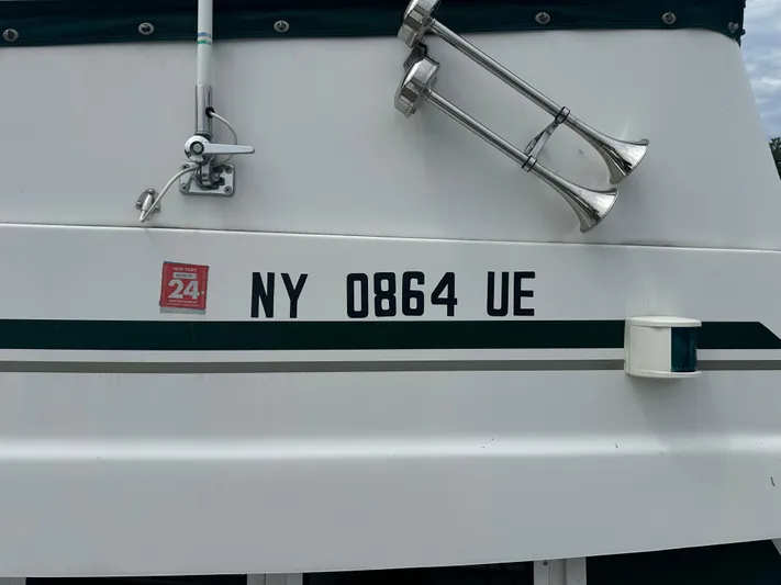 River Miss Yacht Photos Pics 1997 Mainship 350 boat with registration NY 0864 UE and marine equipment.