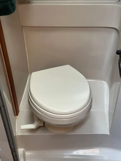 River Miss Yacht Photos Pics 1997 Mainship 350 boat bathroom with white toilet.