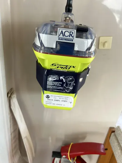 River Miss Yacht Photos Pics ACR Electronics EPIRB device on a 1997 Mainship 350 boat for emergency signaling.