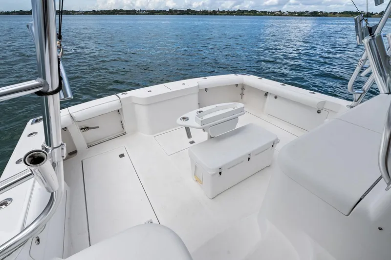 Pescador Yacht Photos Pics 2004 Cabo 40 Hardtop Express boat deck with seating, overlooking calm waters.