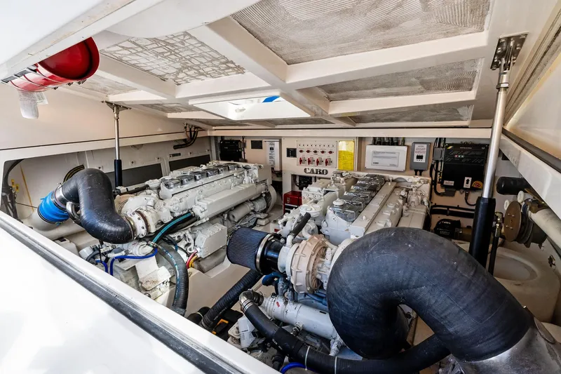 Pescador Yacht Photos Pics Engine room of 2004 Cabo 40 Hardtop Express with dual engines and control systems.