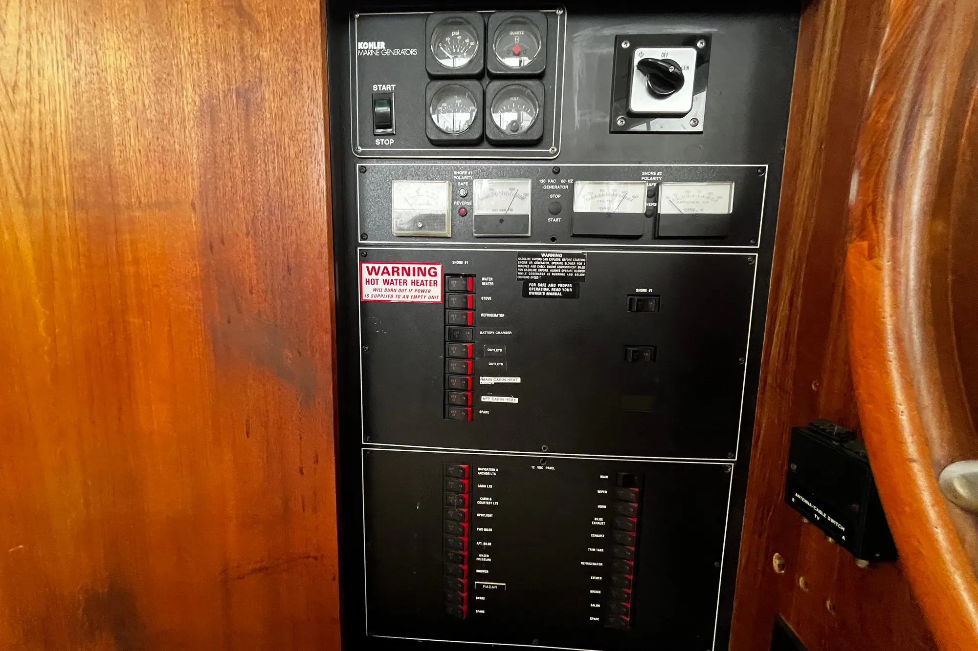 Electrical control panel on a 1991 Carver 33 Aft Cabin Motor Yacht.