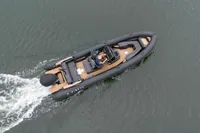 2022 Ribeye A811 boat cruising on water, aerial view, sleek design.