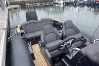 Ribeye A811 boat interior with luxury seating, docked at marina, 2022 model.