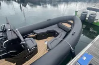Ribeye A811 boat, 2022 model, docked with sleek seating and dual outboard motors.