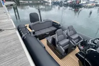 Ribeye A811 boat, 2022 model, docked with luxurious seating and sleek design.