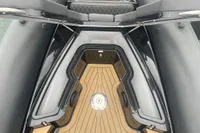 Ribeye A811 boat interior, 2022 model, featuring sleek black design and wooden flooring.