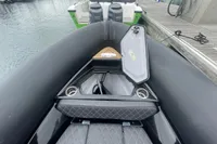 2022 Ribeye A811 boat interior with storage compartment and Yamaha engines at dock.