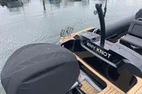 Ribeye A811 boat named "Why Knot" docked on calm water, 2022 model.
