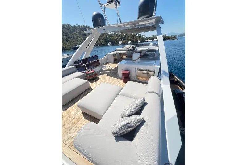  Yacht Photos Pics Luxurious 2010 Numarine 78 yacht deck with elegant seating and scenic ocean view.