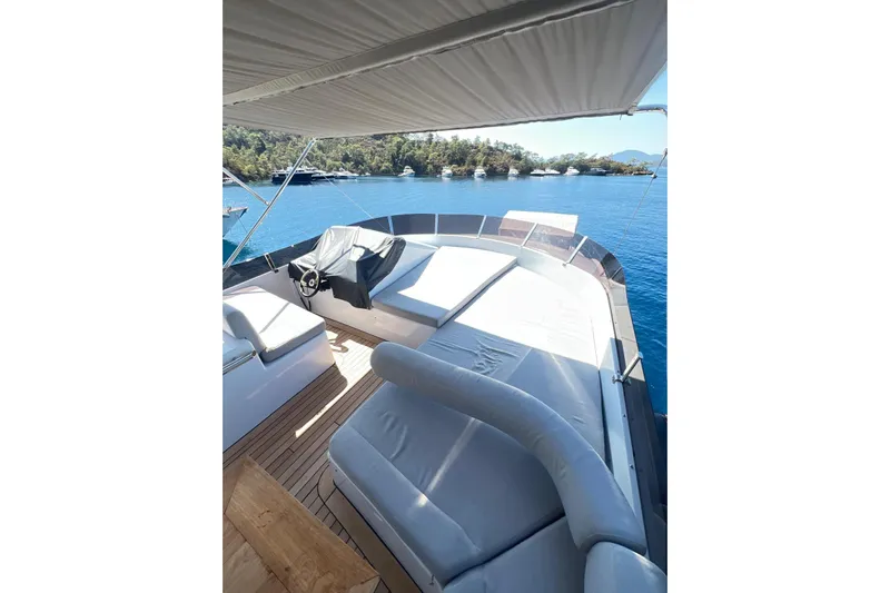  Yacht Photos Pics Luxurious 2010 Numarine 78 yacht deck with sun loungers and scenic ocean view.