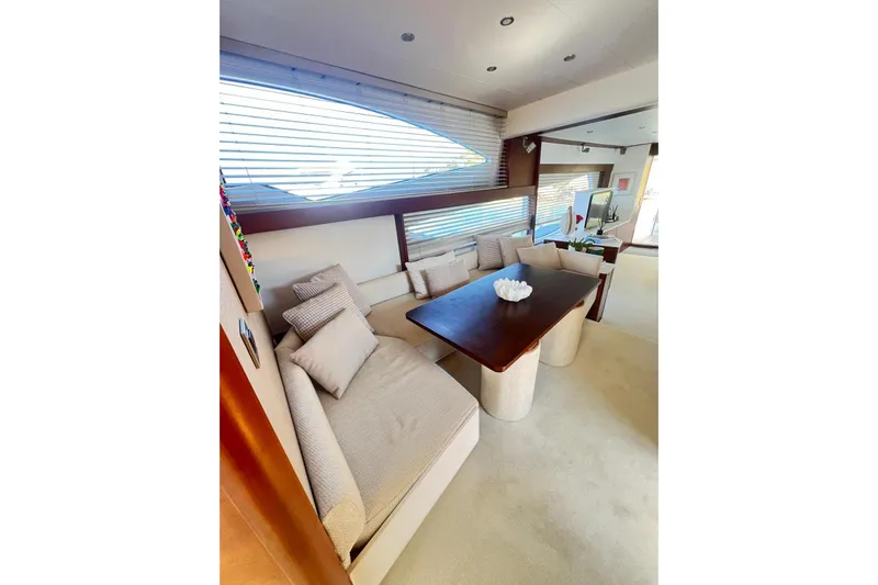  Yacht Photos Pics Luxurious interior of 2010 Numarine 78 yacht with cozy seating and elegant decor.