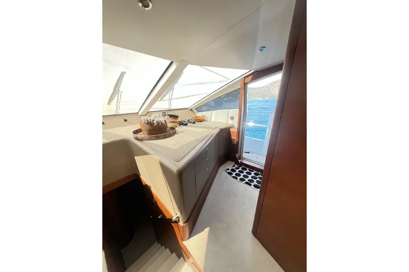  Yacht Photos Pics Interior view of 2010 Numarine 78 yacht with ocean backdrop.