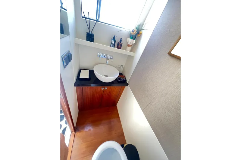  Yacht Photos Pics Luxurious bathroom in 2010 Numarine 78 yacht with modern sink and elegant decor.