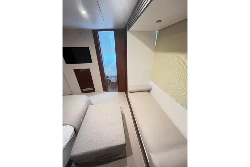  Yacht Photos Pics Luxurious interior of 2010 Numarine 78 yacht with modern furnishings and bathroom view.