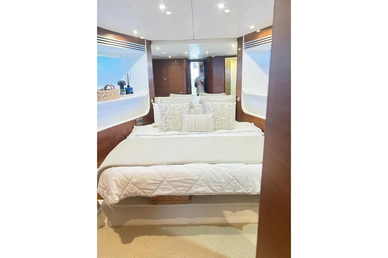  Yacht Photos Pics Luxurious bedroom interior of 2010 Numarine 78 yacht with elegant bedding and modern decor.