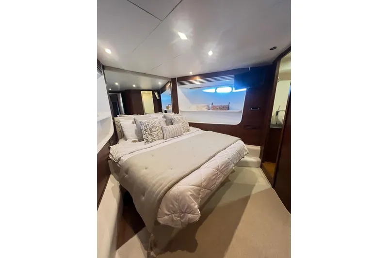  Yacht Photos Pics Luxurious bedroom interior of 2010 Numarine 78 yacht with elegant bedding and modern design.