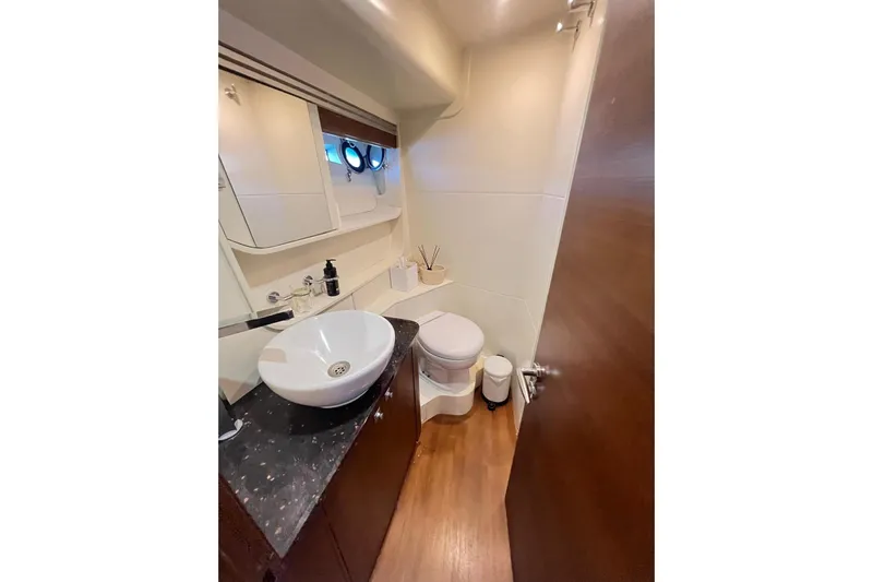  Yacht Photos Pics Luxurious bathroom in 2010 Numarine 78 yacht with modern fixtures and elegant design.