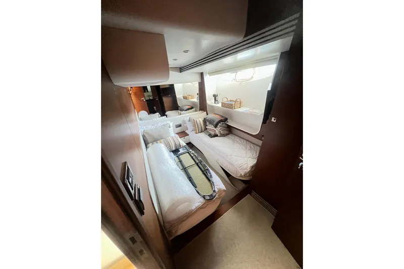  Yacht Photos Pics Interior cabin of 2010 Numarine 78 yacht with twin beds and modern decor.