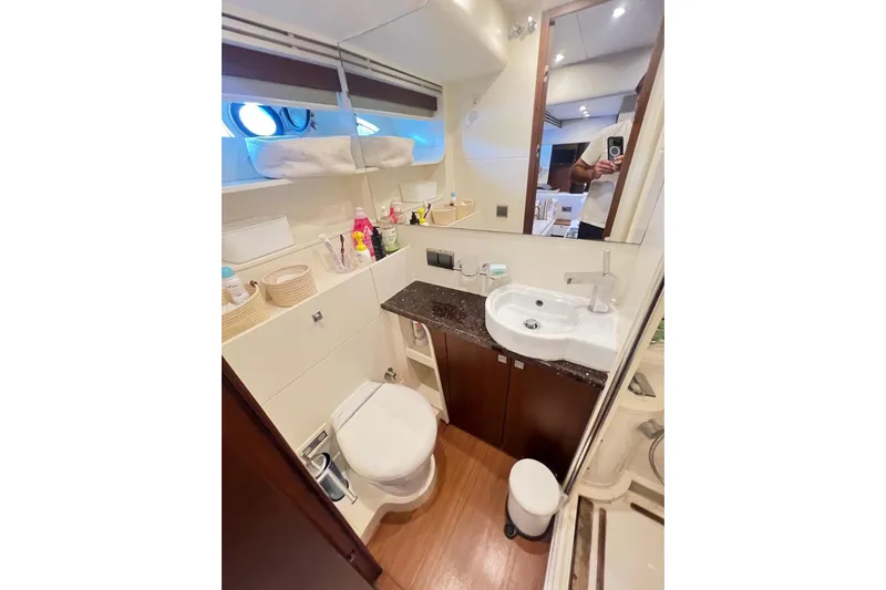  Yacht Photos Pics Luxurious bathroom in 2010 Numarine 78 yacht with modern amenities and elegant design.