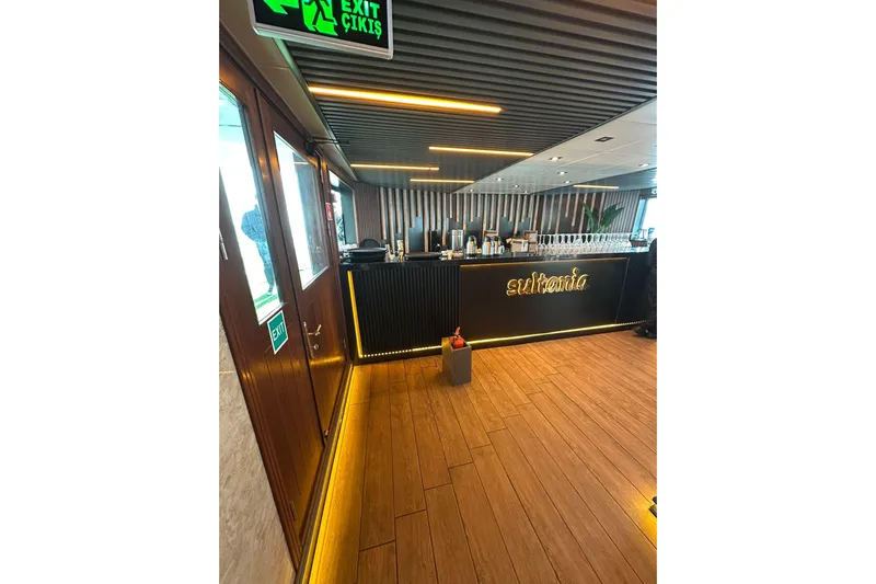  Yacht Photos Pics Luxurious bar area on a 2012 Turkish Boat Yard 49m yacht, featuring modern design and ambient lighting.