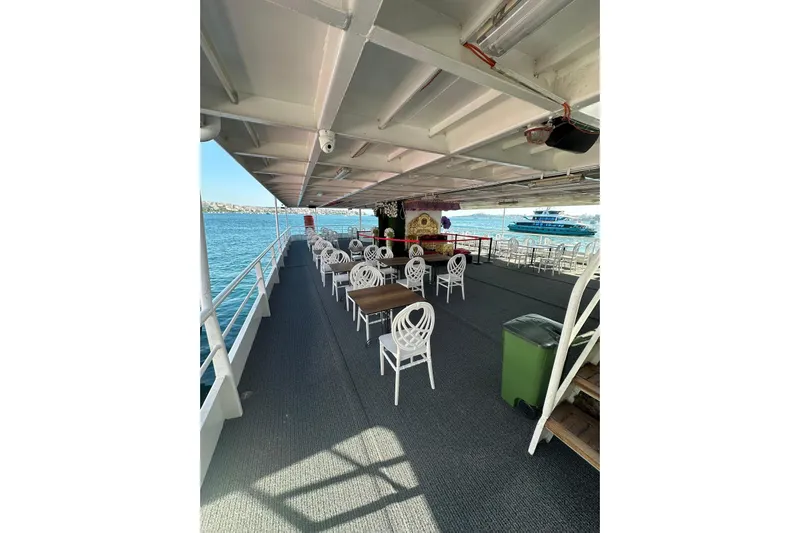  Yacht Photos Pics Open deck of 2012 Turkish Boat Yard 49m yacht with seating, overlooking the sea.