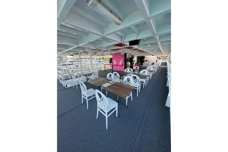  Yacht Photos Pics Luxurious 2012 Turkish Boat Yard 49m yacht with elegant dining area and floral decor.