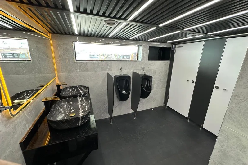  Yacht Photos Pics Luxurious yacht bathroom with marble sinks, urinals, and modern design, Turkish Boat Yard 49m, 2012.
