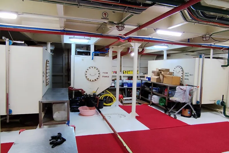  Yacht Photos Pics Engine room of a 2012 Turkish Boat Yard 49m yacht, featuring equipment and storage.