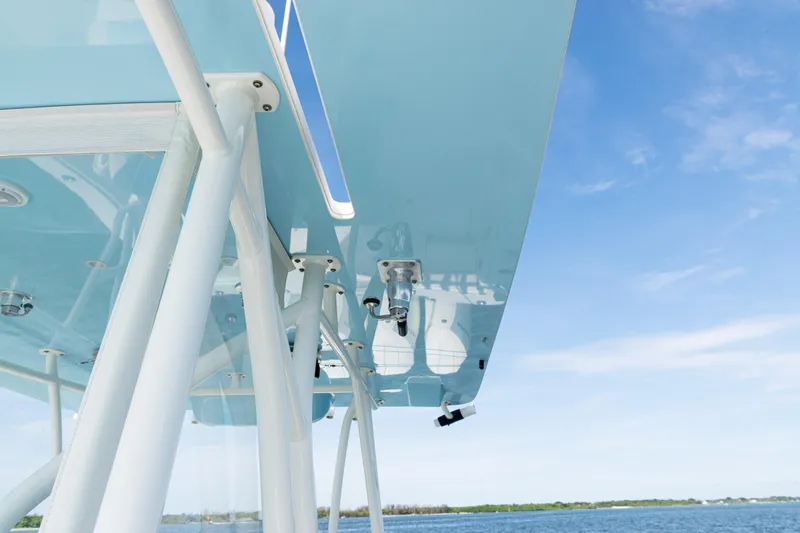  Yacht Photos Pics 2021 SeaVee 390 boat canopy against a clear blue sky.