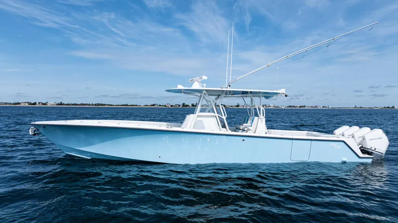  Yacht Photos Pics 2021 SeaVee 390 boat on open water, clear sky background.