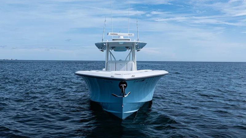  Yacht Photos Pics 2021 SeaVee 390 boat on open ocean under clear sky.