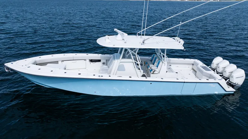  Yacht Photos Pics 2021 SeaVee 390 boat on open water, featuring multiple outboard engines.