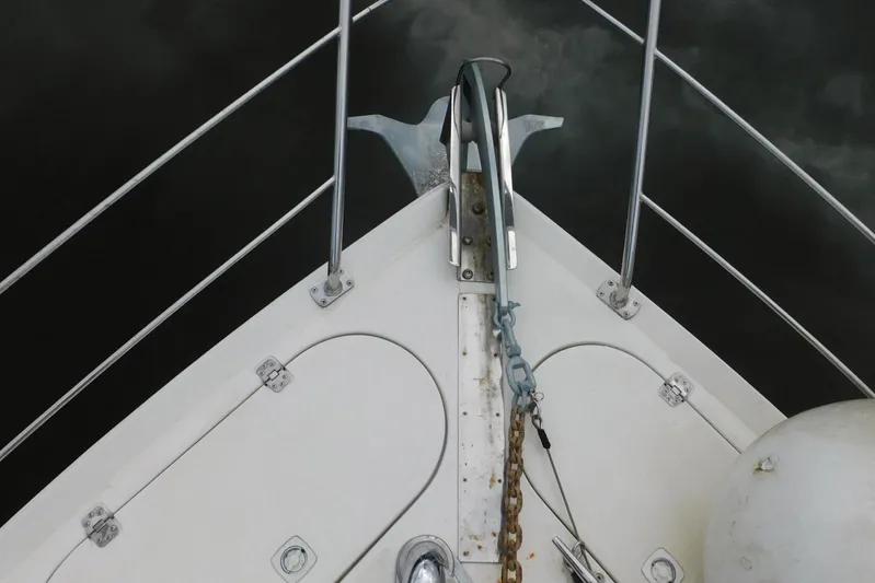 Waterdog Yacht Photos Pics Bow of 2002 Carver 570 Voyager Pilothouse with anchor and chain.