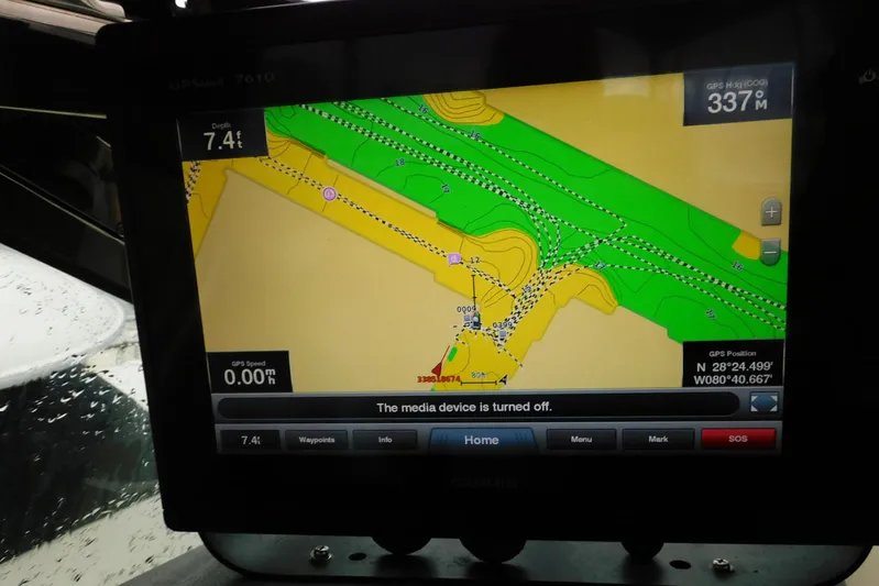 Waterdog Yacht Photos Pics GPS navigation screen on a 2002 Carver 570 Voyager Pilothouse, showing map and coordinates.