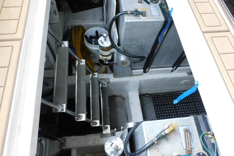 Waterdog Yacht Photos Pics Engine room of 2002 Carver 570 Voyager Pilothouse with equipment and stairs.