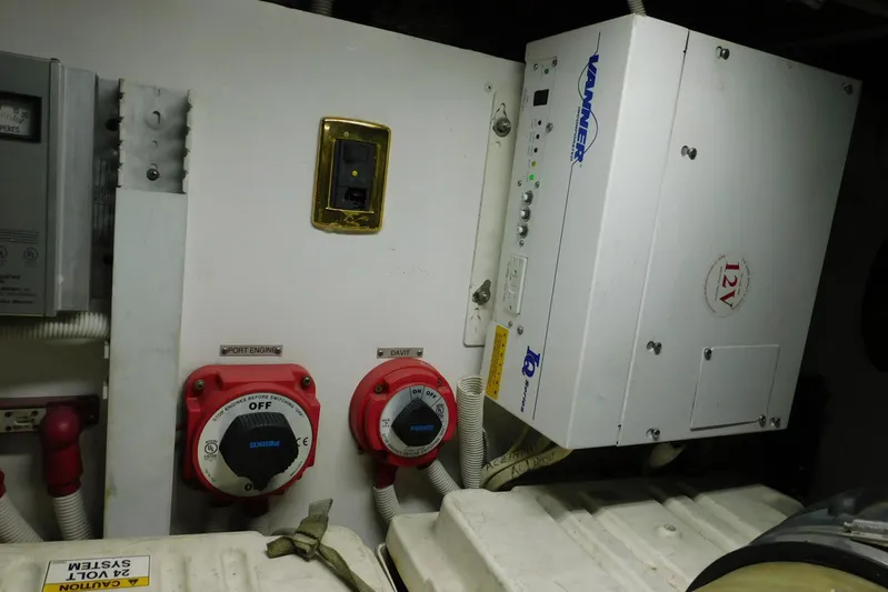 Waterdog Yacht Photos Pics Engine room of 2002 Carver 570 Voyager Pilothouse with electrical controls and switches.