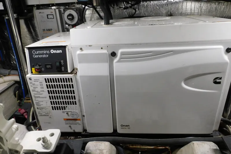 Waterdog Yacht Photos Pics Cummins Onan generator in 2002 Carver 570 Voyager Pilothouse engine room.