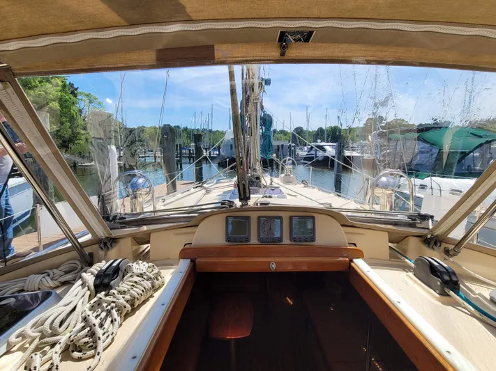 Mango Lll Yacht Photos Pics Cockpit view of 2006 Island Packet 370 sailboat docked at marina.