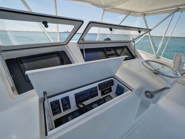  Yacht Photos Pics 2007 Viking Convertible yacht helm with advanced navigation controls and ocean view.
