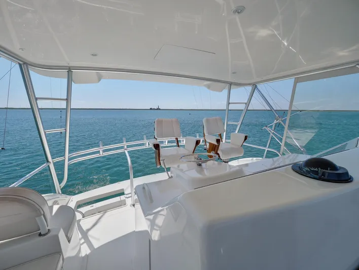  Yacht Photos Pics 2007 Viking Convertible yacht mezzanine with ocean view and seating.