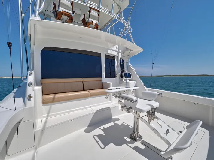  Yacht Photos Pics 2007 Viking Convertible yacht with mezzanine, featuring spacious deck and seating area.