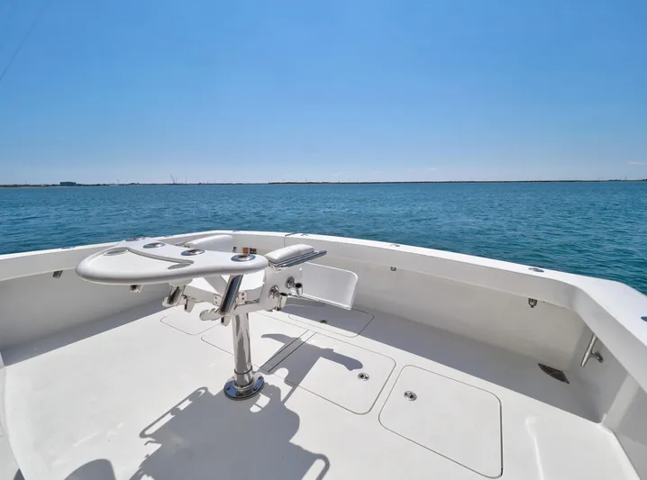  Yacht Photos Pics 2007 Viking Convertible boat deck overlooking calm blue ocean.
