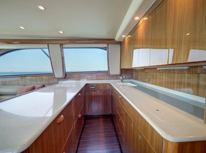  Yacht Photos Pics Luxurious 2007 Viking Convertible yacht interior with sleek wood cabinetry and spacious countertops.