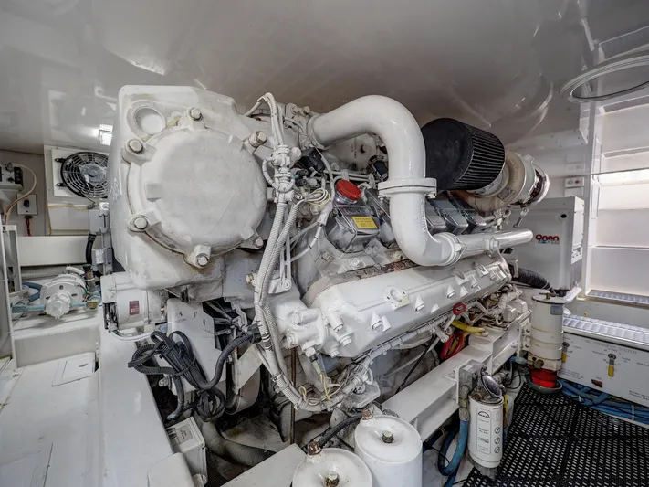  Yacht Photos Pics Engine room of 2007 Viking Convertible w/ Mezzanine yacht, showcasing detailed machinery.