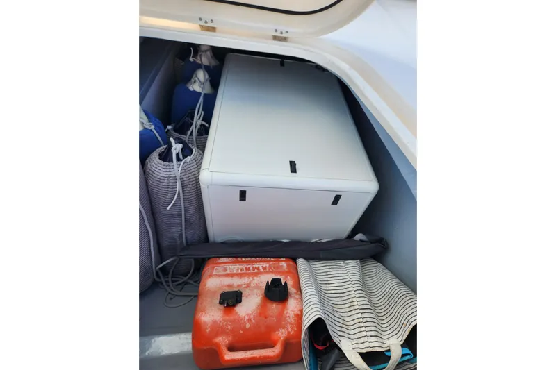 Leopard 46 Yacht Photos Pics Storage compartment on a 2009 Leopard 46 yacht with equipment and supplies.