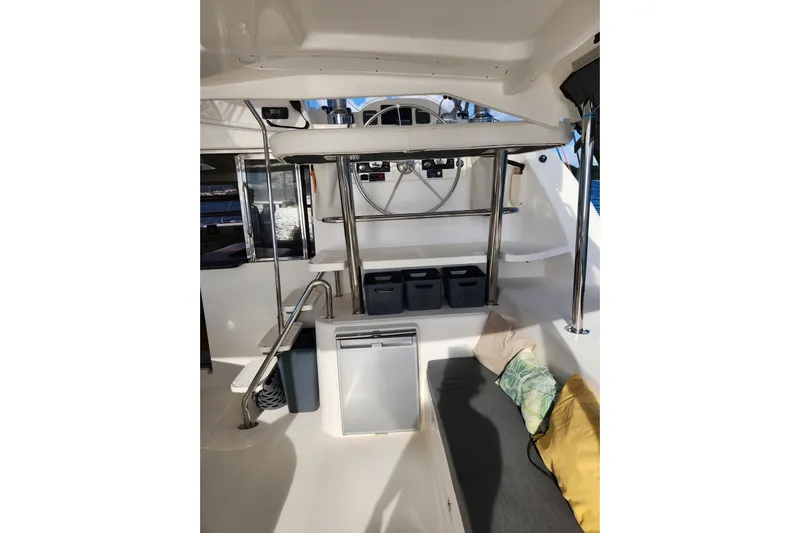 Leopard 46 Yacht Photos Pics Interior of 2009 Leopard 46 yacht with seating, storage, and helm station.