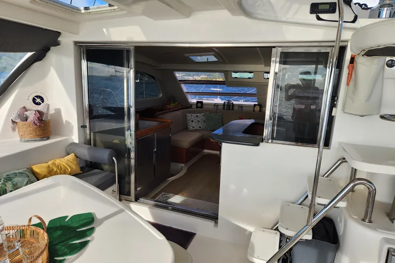 Leopard 46 Yacht Photos Pics Interior of 2009 Leopard 46 catamaran, featuring cozy seating and modern design elements.