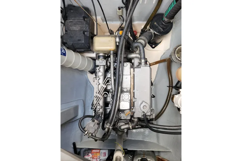 Leopard 46 Yacht Photos Pics Engine compartment of a 2009 Leopard 46 yacht, showcasing mechanical components and wiring.