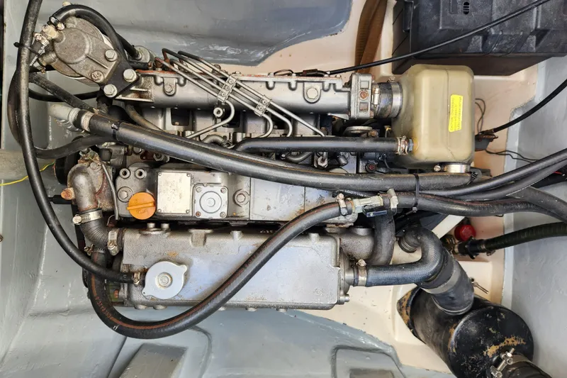 Leopard 46 Yacht Photos Pics Engine compartment of a 2009 Leopard 46 yacht, showcasing mechanical components and hoses.